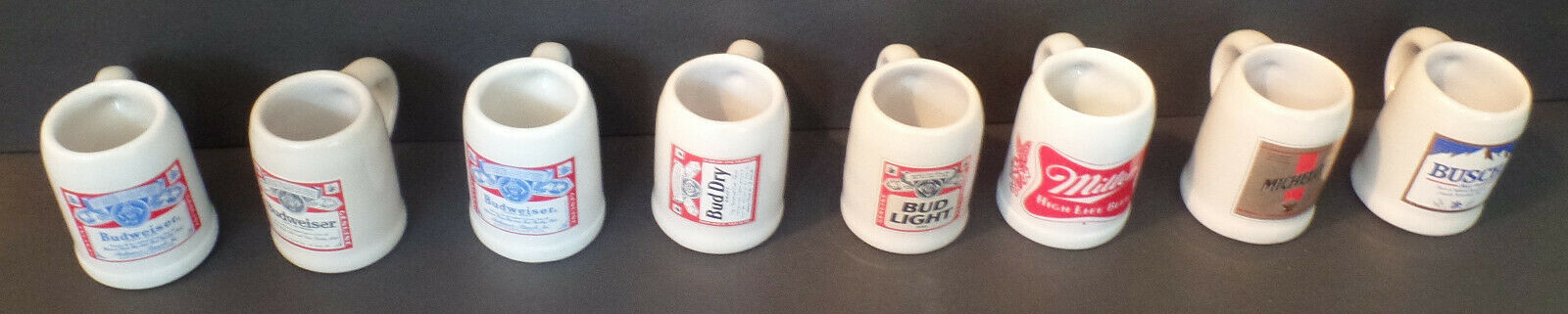Lot Of (8)  Mini Ceramic Beer Steins