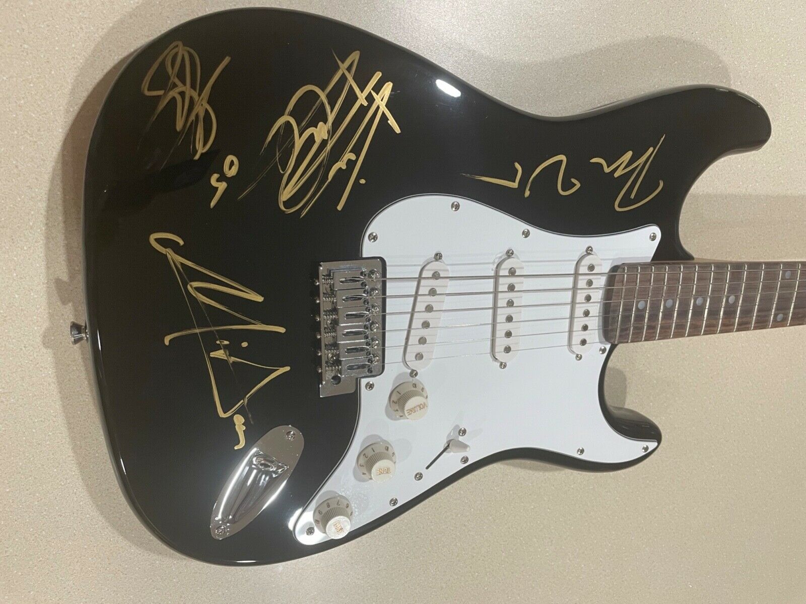 Rolling Stones autographed Fender  Squire guitar